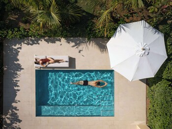 4 outdoor pools, open 6:00 AM to 6:00 PM, cabanas (surcharge)
