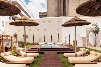 Seasonal outdoor pool, pool umbrellas, pool loungers