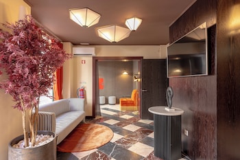 Stroll down the charming corridor to discover historic buildings and scenic views of the adjacent river.