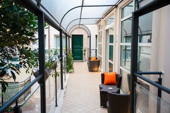 Suite superior, balcó, zona de pati | Vista des de l'habitació