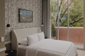 Deluxe King | 1 Schlafzimmer, hochwertige Bettwaren, Daunenbettdecken
