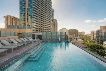 Outdoor pool, pool cabanas (surcharge), pool loungers