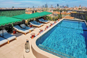 Outdoor pool, open 9:00 AM to 6:00 PM, pool umbrellas, sun loungers