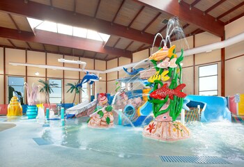 Indoor pool, seasonal outdoor pool, pool umbrellas, sun loungers