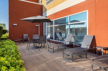 A Fairfield by Marriott hotel with a modern design, featuring a prominent entrance and multiple floors.