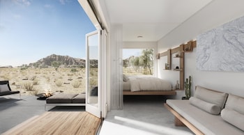 Premium bedding, desk, laptop workspace, free WiFi