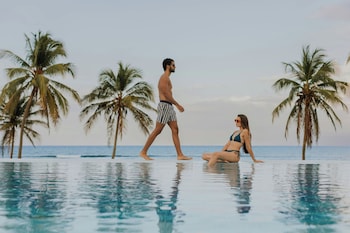 2 outdoor pools, cabanas (surcharge), pool umbrellas
