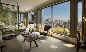 Suit Quadruple Room | Minibar, in-room safe, laptop workspace, soundproofing