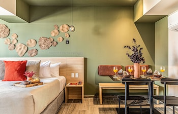 Deluxe Apartment, Balcony, City View | Hypo-allergenic bedding, in-room safe, individually decorated