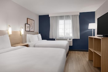 Desk, laptop workspace, free WiFi, bed sheets