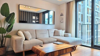 Design Apartment, 2 Bedrooms, City View | Living area | Smart TV, computer monitors