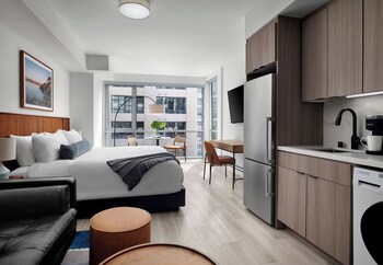 Premium bedding, pillowtop beds, desk, laptop workspace