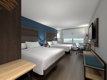 Premium bedding, desk, laptop workspace, blackout curtains