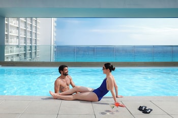6 bars/lounges, 2 swim-up bars