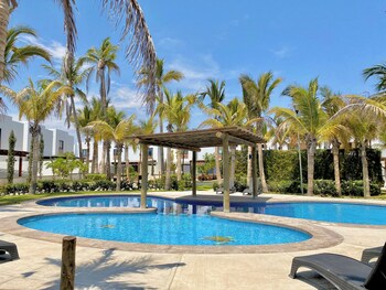 Outdoor pool, open 9:00 AM to 10:00 PM, pool umbrellas, sun loungers