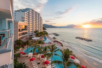 On the beach, beach umbrellas, beach towels, beach yoga