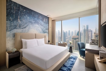 Premium bedding, down comforters, minibar, in-room safe