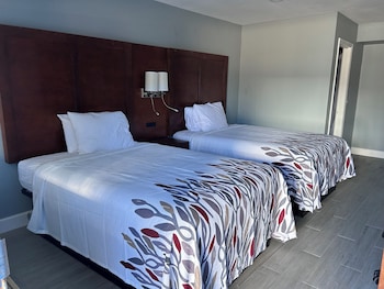 Desk, laptop workspace, blackout drapes, iron/ironing board