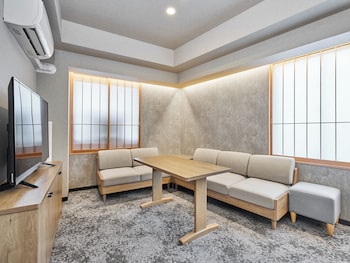 Two-Bedroom Family Apartment | Down comforters, in-room safe, WiFi (free), bed sheets