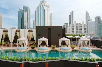 Outdoor pool, open 7:00 AM to 8:00 PM, free pool cabanas, pool loungers