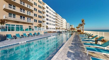 Outdoor pool. Landing Furnished Apartments - Daytona Beach