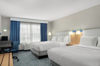 Down comforters, desk, laptop workspace, blackout drapes