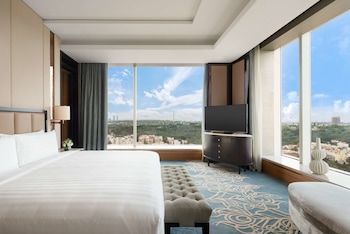 Designer toiletries, hair dryer, bathrobes, slippers