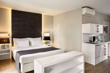 Ropa de cama de alta calidad y minibar