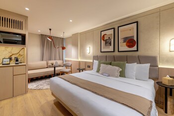 Apartamento superior, balcón, vistas a la ciudad | Balcón