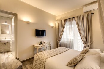 Frette Italian sheets, premium bedding, down comforters