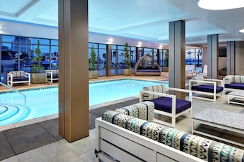 Outdoor pool, open 7:00 AM to 10:00 PM, free cabanas, sun loungers