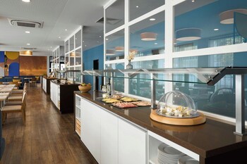 Daily buffet breakfast (EUR 18 per person)