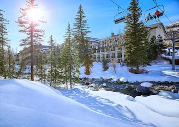 Outdoor pool, open 7:00 AM to 11:00 PM, pool umbrellas, pool loungers