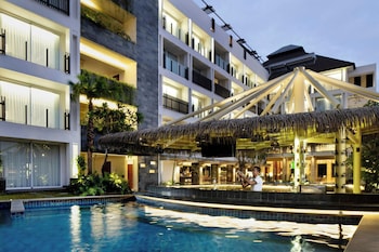Outdoor pool, open 8:00 AM to 8:00 PM, free cabanas, pool umbrellas