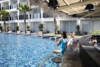 Outdoor pool, open 8:00 AM to 8:00 PM, free cabanas, pool umbrellas