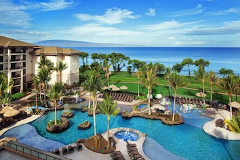2 outdoor pools, cabanas (surcharge), pool umbrellas