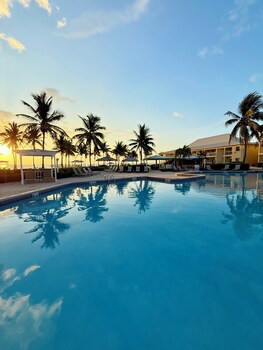 Breakfast, lunch, dinner served; international cuisine, pool views 