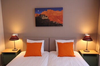 Premium bedding, individually decorated, individually furnished, desk