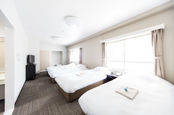 Chambre Quadruple Standard | Fer et planche à repasser, Wi-Fi gratuit, draps fournis