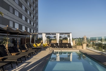 Outdoor pool, cabanas (surcharge), pool umbrellas
