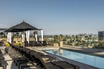 Outdoor pool, cabanas (surcharge), pool umbrellas
