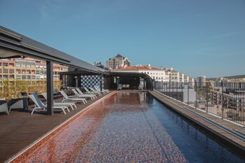 Seasonal outdoor pool, sun loungers