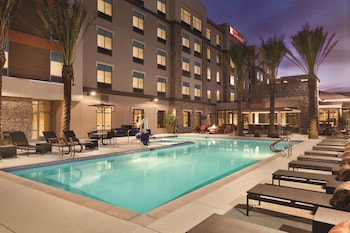 Outdoor pool, open 9:00 AM to 11:00 PM, pool umbrellas, sun loungers