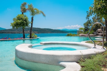 Indoor pool, outdoor pool, open 10:00 AM to 5:00 PM, pool umbrellas