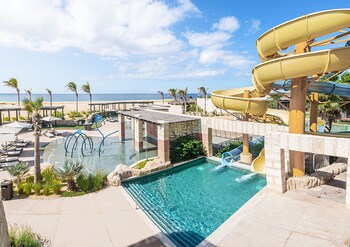 4 outdoor pools, cabanas (surcharge), pool umbrellas