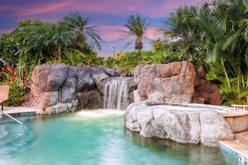 Outdoor pool, open 8:00 AM to 10:00 PM, sun loungers