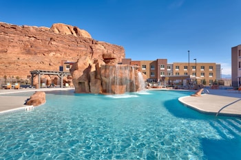 2 outdoor pools, open 8:00 AM to 10:00 PM, pool umbrellas, sun loungers