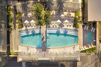 Outdoor pool, a heated pool, cabanas (surcharge), pool umbrellas