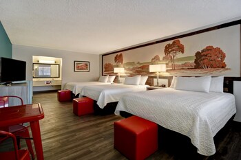 Outdoor pool, open 7:00 AM to 11:00 PM, pool umbrellas