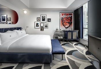 Premium bedding, down comforters, minibar, in-room safe